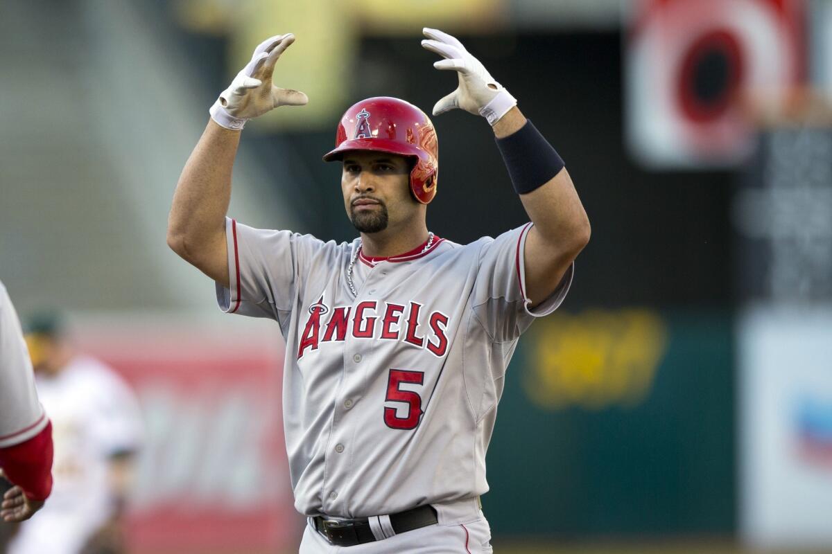 Albert Pujols hit an RBI single in the fourth inning to score Kole Calhoun from third base. The Angels scored two more runs in the inning before defeating the Athletics, 9-4.
