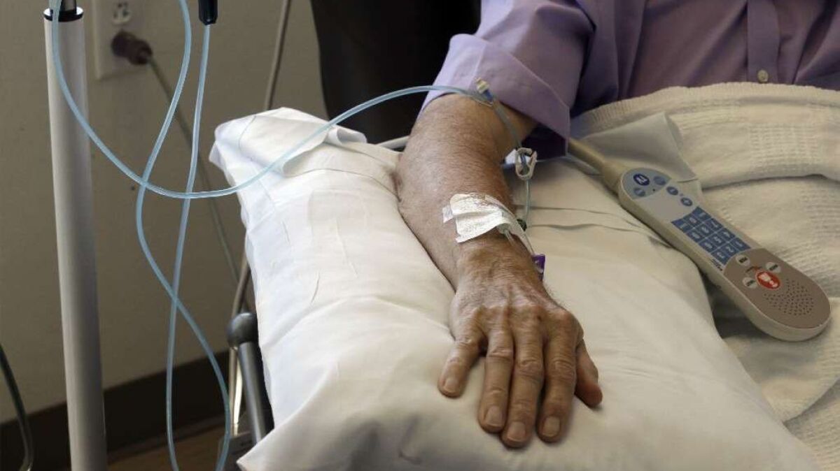 Chemotherapy is administered to a cancer patient at Duke Cancer Center in Durham, N.C.