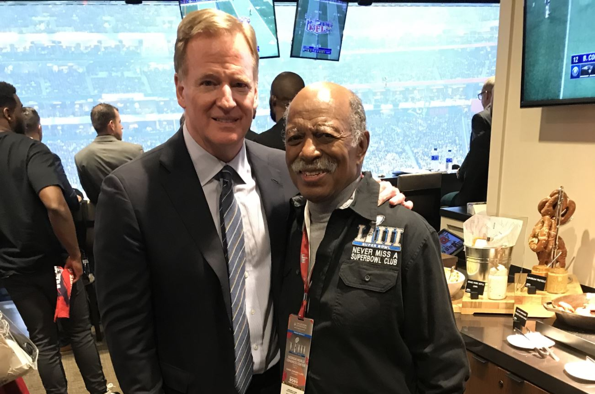 Gregory Eaton, right,  with NFL Commissioner Roger Goodell.