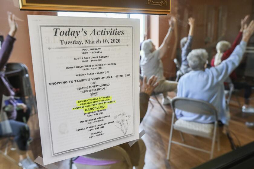 Residents at the St. Paul's Plaza independent and assisted living facility attend the Gentle Stretch class led by fitness coordinator Janet Blair on March 10, 2020 in Chula Vista, California. Residents of the facility are staying active despite cancelation of all activities involving members of the public coming to the facility. Students from High Tech High were scheduled to attend the facility but the event was cancelled.