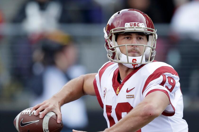 Southern Cal quarterback Matt Fink in action against Washington in an NCAA college football game Saturday, Sept. 28, 2019, in Seattle. (AP Photo/Elaine Thompson)