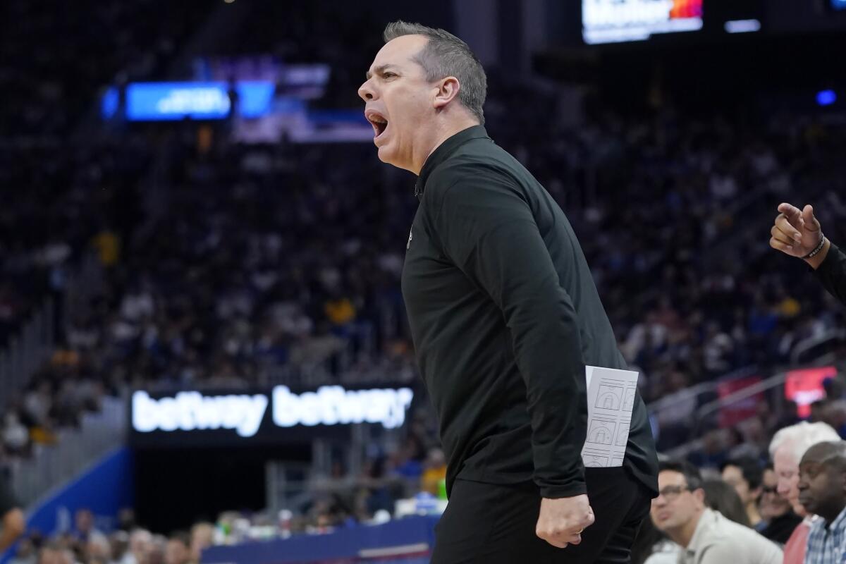 Lakers coach Frank Vogel shouts to officials during the first half Friday.