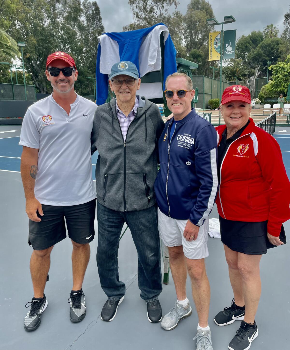 Drew Arbeiter, tennis legend Roy Emerson, Eric Davidson and Adoption Guild president Chris Garber.