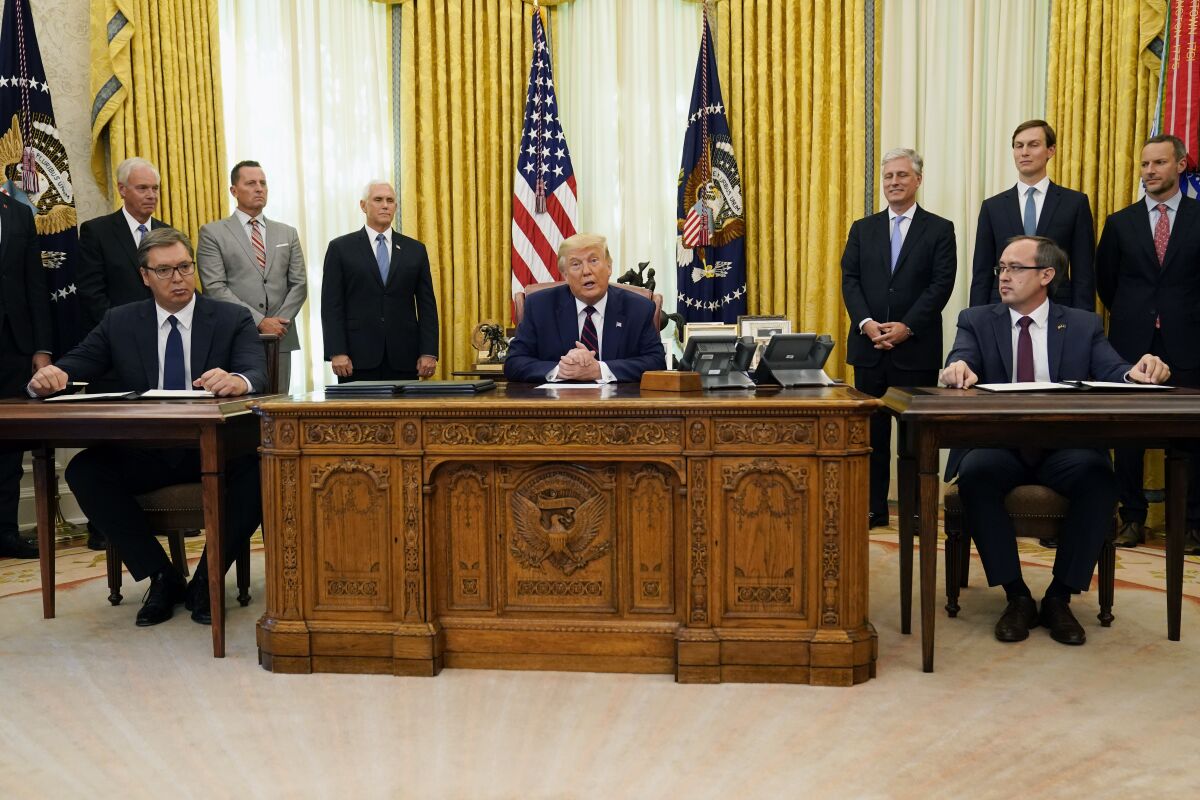 President Trump with Serbian President Aleksandar Vucic, left, and Kosovar Prime Minister Avdullah Hoti in the Oval Office
