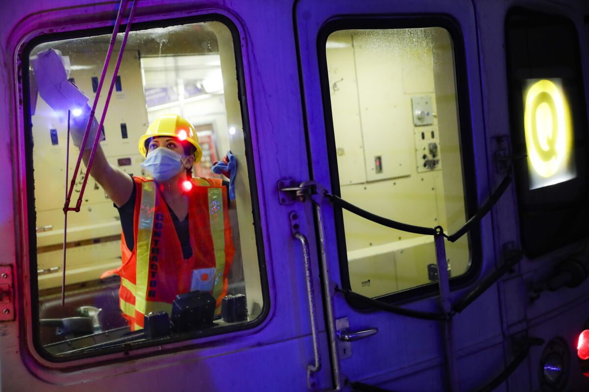 A contractor cleans an L.A. subway car on July 2.