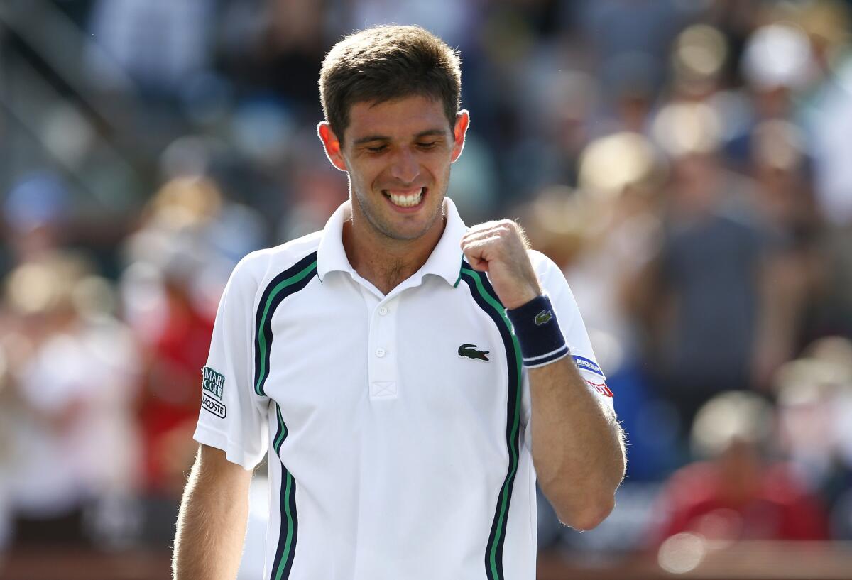 Federico Delbonis celebrates with a fist pump after defeating Andy Murray in a third-round match at the BNP Paribas Open at Indian Wells.