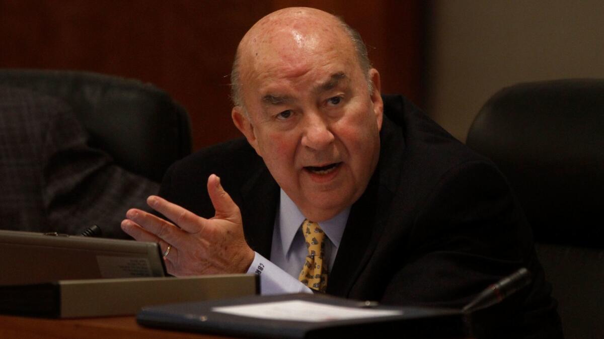 Cal State Chancellor Charles B. Reed addresses the trustees on the issue of executive salary caps in 2012. Reed, who steered CSU through record budget cuts and opened access to underrepresented students, has died at 75.