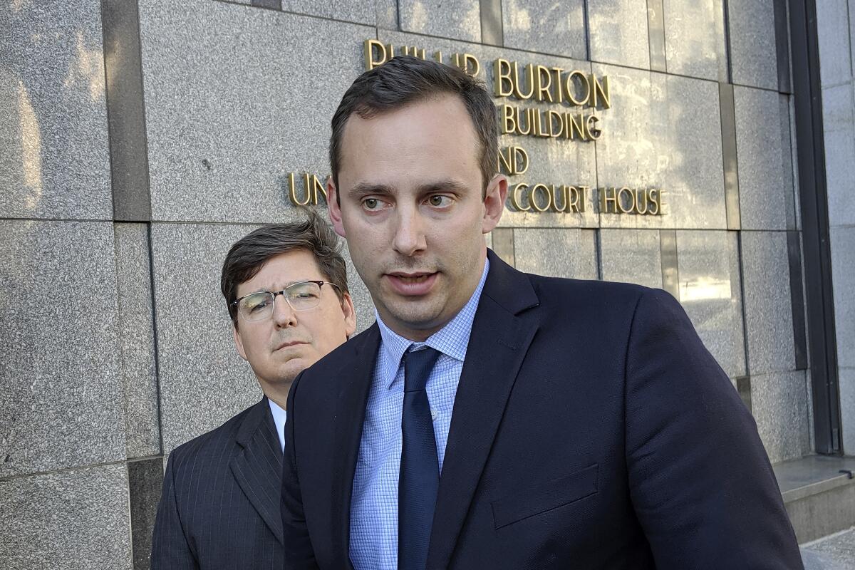 Anthony Levandowski in front of his attorney, Miles Ehrlich, outside of a federal courthouse in San Francisco. 