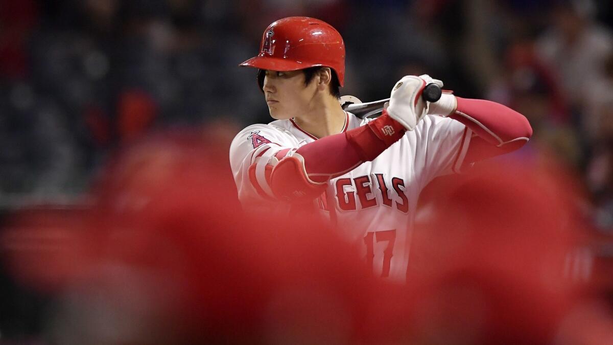 Shohei Ohtani, who is expected to spend most of the 2019 season as the Angels' designated hitter, might not be medically cleared to play until opening day.