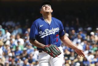 Los Angeles, CA - April 16: Dodgers' Julio Urias looks up in agony after allowing a home run to Chicago Cubs' Patrick Wisdom during the sixth inning at Dodger Stadium on Sunday, April 16, 2023 in Los Angeles, CA.(Robert Gauthier / Los Angeles Times)
