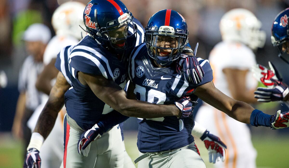 Mississippi defensive backs Mike Hilton (28) and Senquez Golson have had plenty to celebrate this season, including a big play Saturday in a victory over Tennessee.