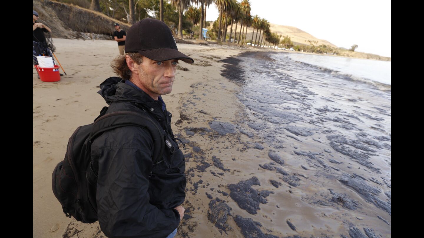 Morgan Miller looks at the devastation. The pipeline rupture leaked an estimated 21,000 gallons of crude oil.