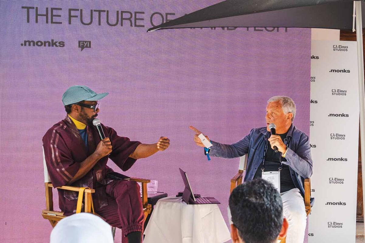 Photo of will.i.am and Sir Martin Sorrell