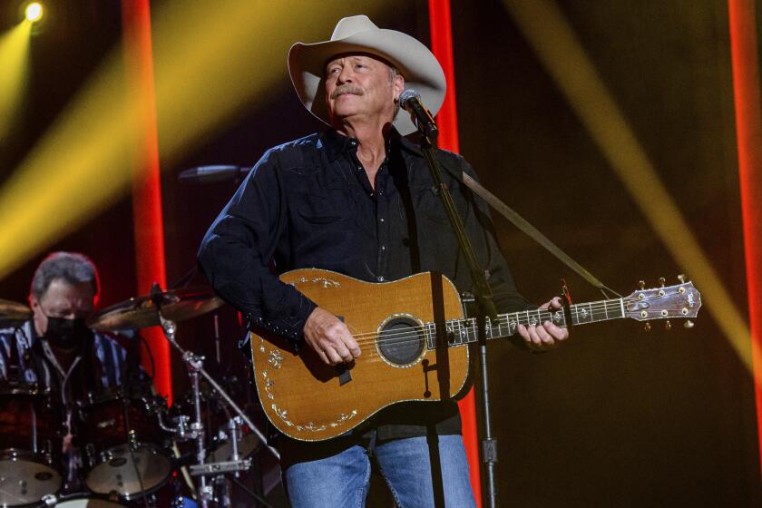 FILE - Alan Jackson performs at the 56th annual Academy of Country Music Awards on April 15, 2021 in Nashville, Tenn. Jackson revealed in a new interview that he has a degenerative nerve condition that has affected his balance. The 62-year-old Country Music Hall of Famer said in an interview on NBC's “Today” show that he was diagnosed with Charcot-Marie-Tooth disease a decade ago. (Photo by Amy Harris/Invision/AP, File)