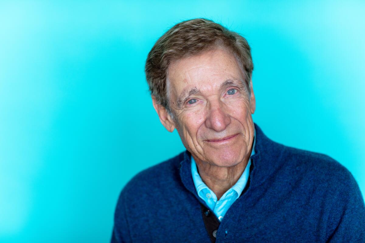 Maury Povich smiles for a photo
