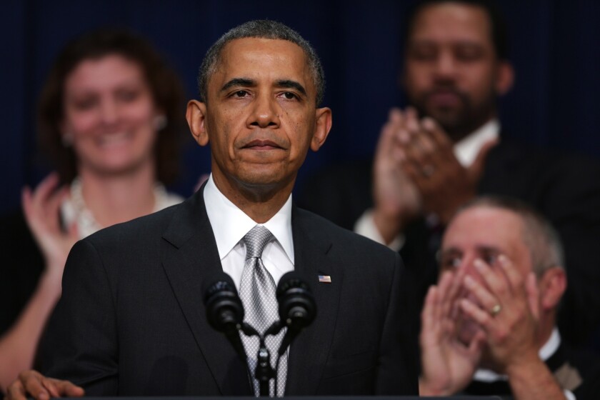 President Obama pauses as he makes a statement on the Affordable Care Act in the South Court Auditorium at the Eisenhower Executive Office Building in Washington, D.C. The White House has started a month-long campaign to promote the benefits of the 2010 law.