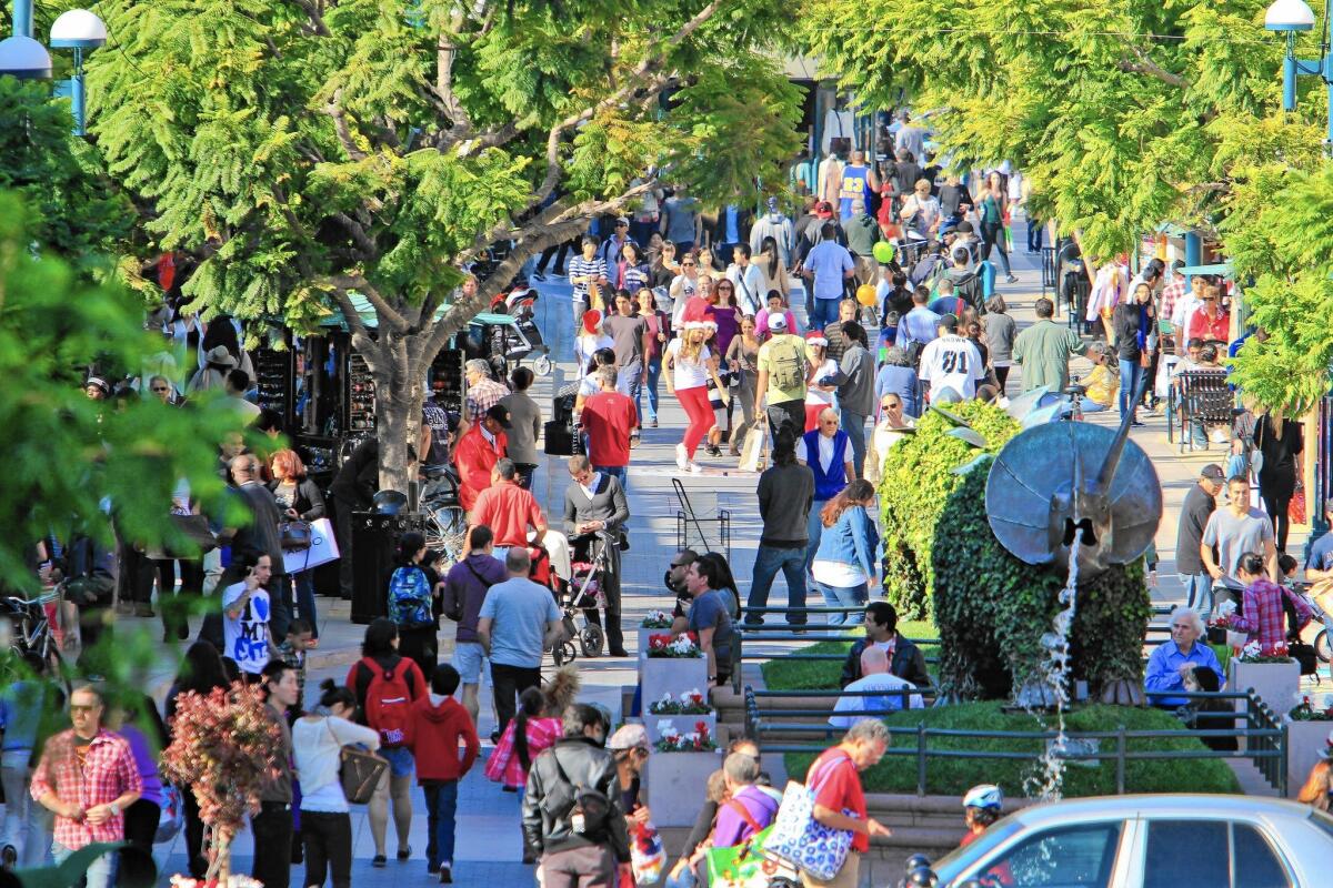 The tourism industry in L.A. County has been on the rebound since the recession, in part because of an increase in high-spending visitors from China, Japan, Brazil, Australia and France, as well as the growth in domestic visitors. Above, crowds along Santa Monica's Third Street Promenade in 2011.