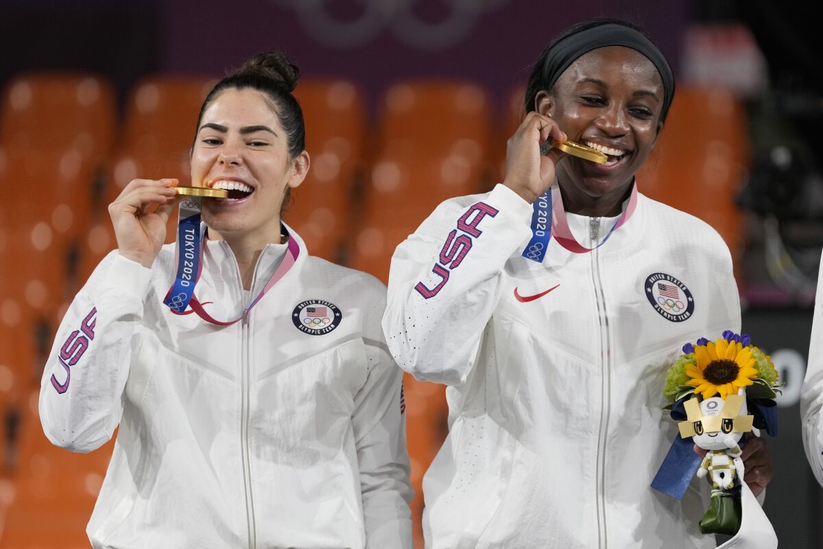 Members of team United States Kelsey Plum, left, and Jacquelyn Young