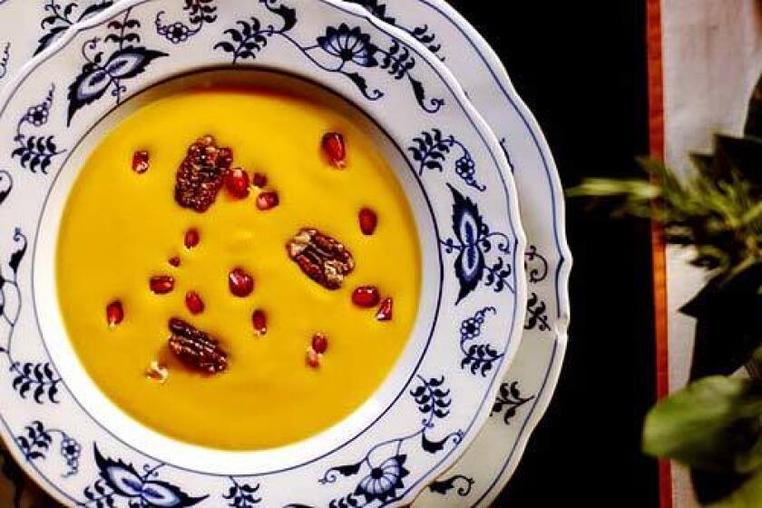 Garnish with fresh pomegranate seeds and candied pecans -- perfect for the holiday table. Kabocha squash soup with pomegranate seeds