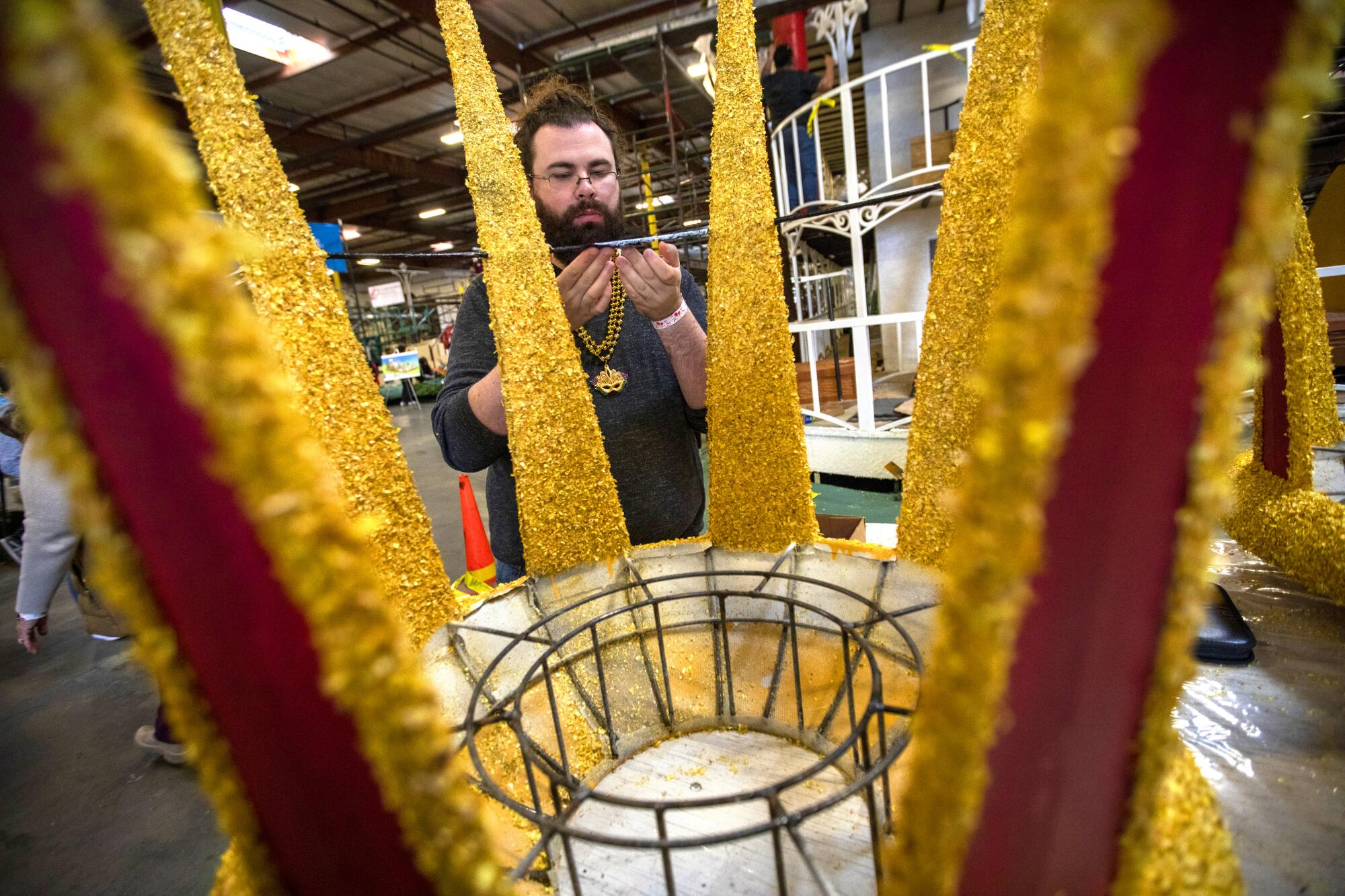 Nick Exeter works on the Louisiana float.