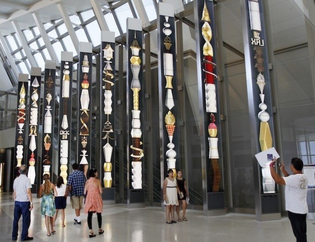 North concourse portals at the Tom Bradley International Terminal at LAX feature 28-foot high columns of vertical stacked monitors displaying changing artwork.