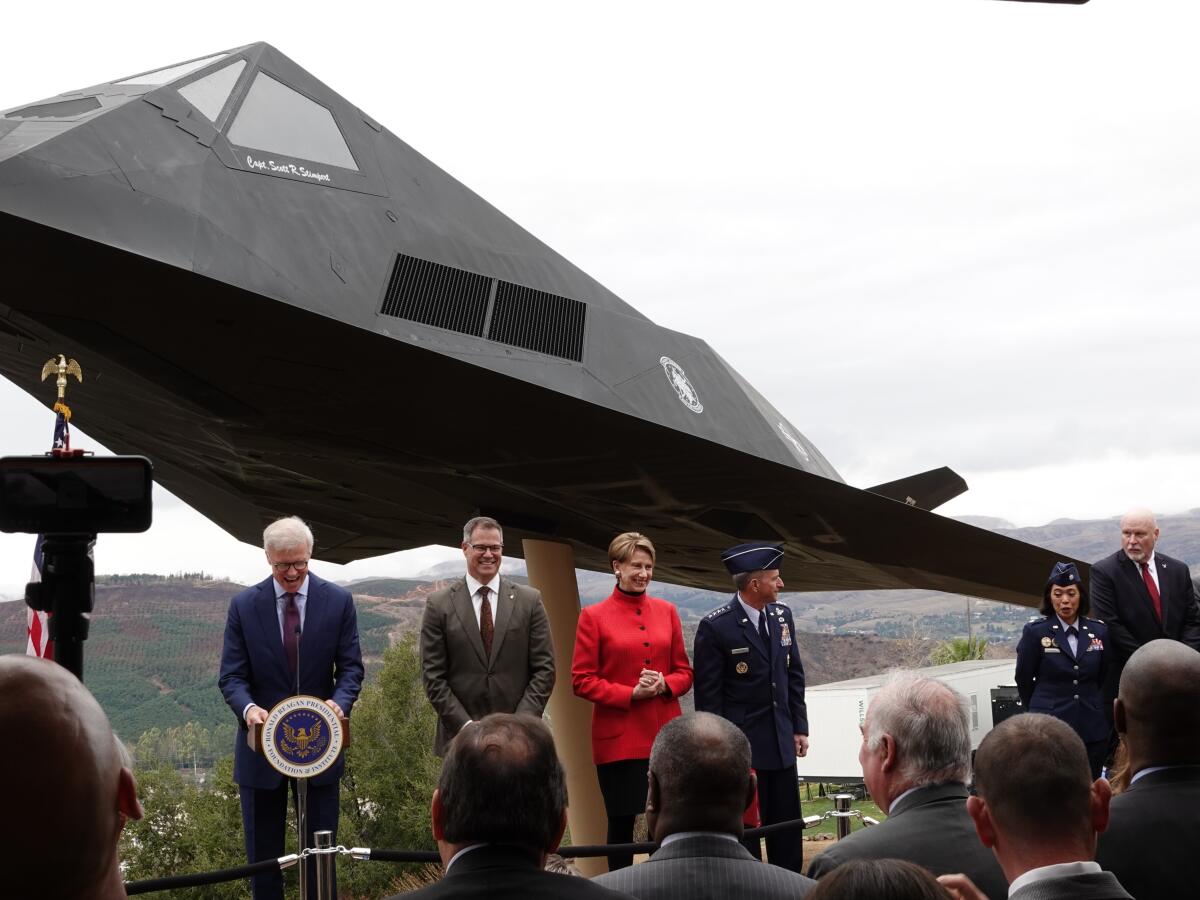 Officials gather to launch the F-117 Nighthawk stealth fighter exhibit at the Ronald Reagan Presidential Library and Museum in Simi Valley, Calif