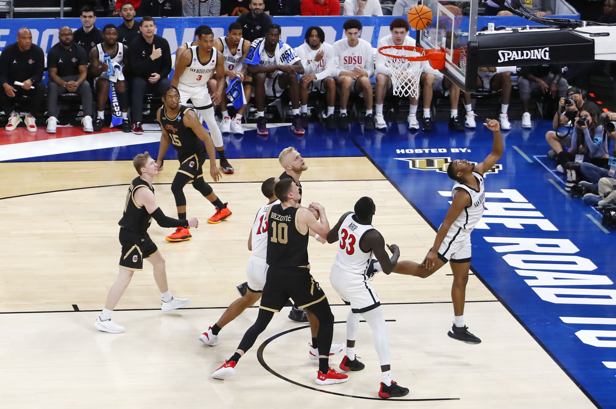 San Diego State's Lamont Butler scores against College of Charleston.
