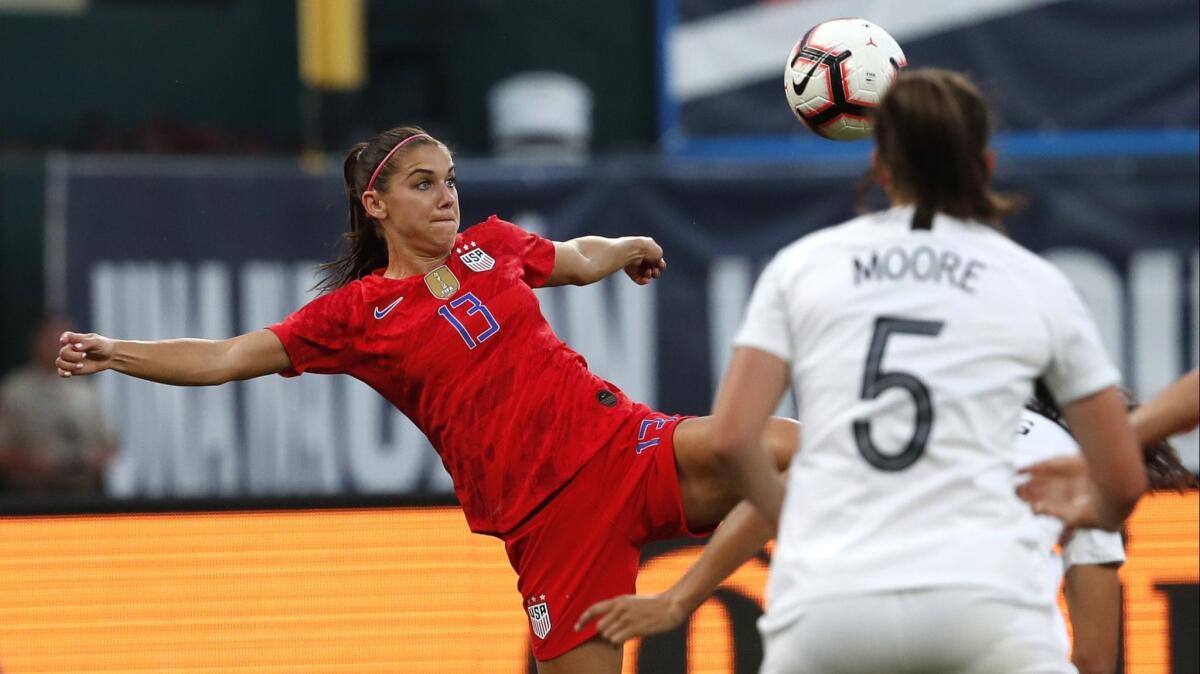 Alex Morgan keeps her eye on the ball during an international friendly match against New Zealand on May 16.