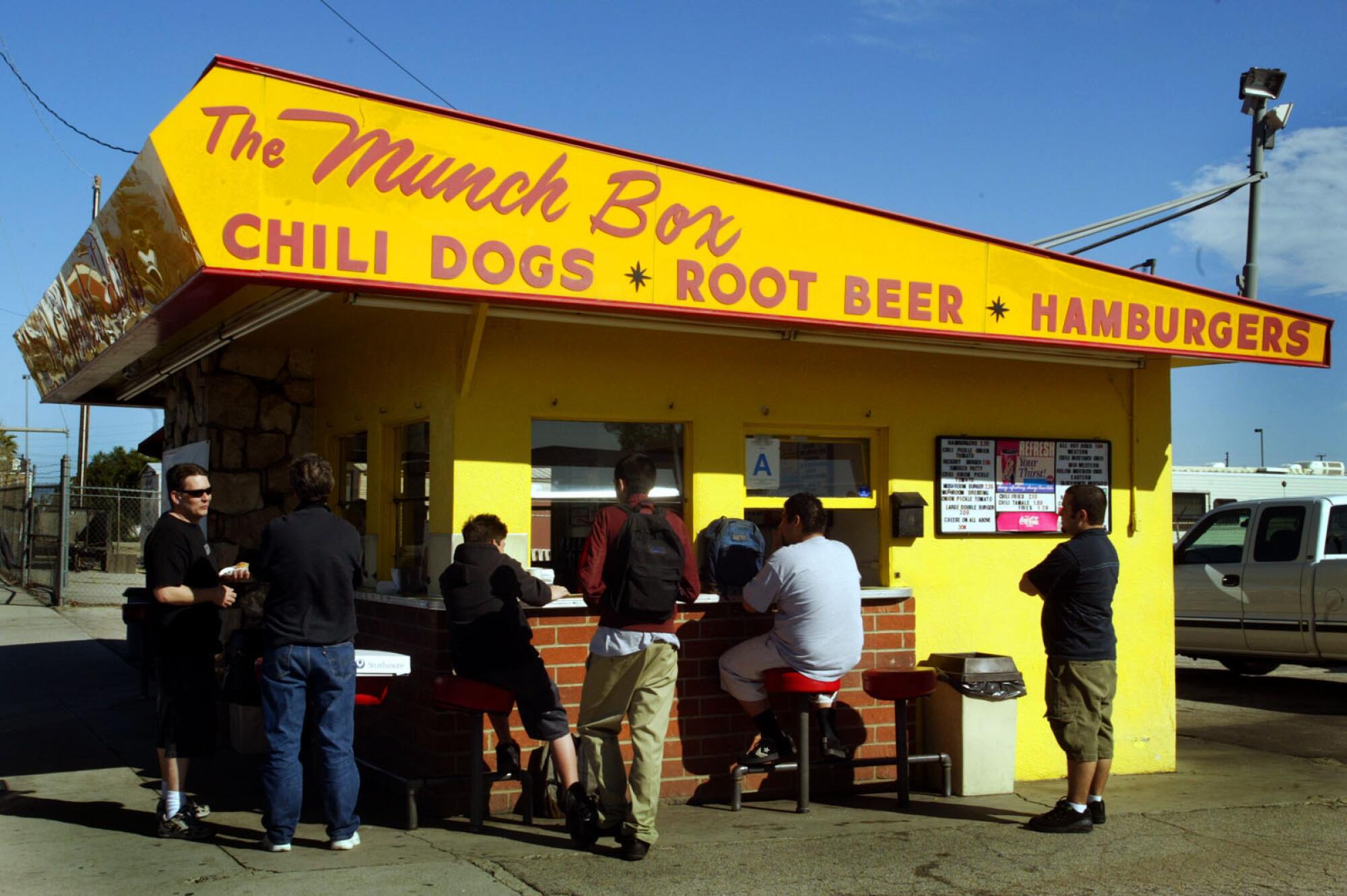 People wait at the Munch Box in Chatsworth