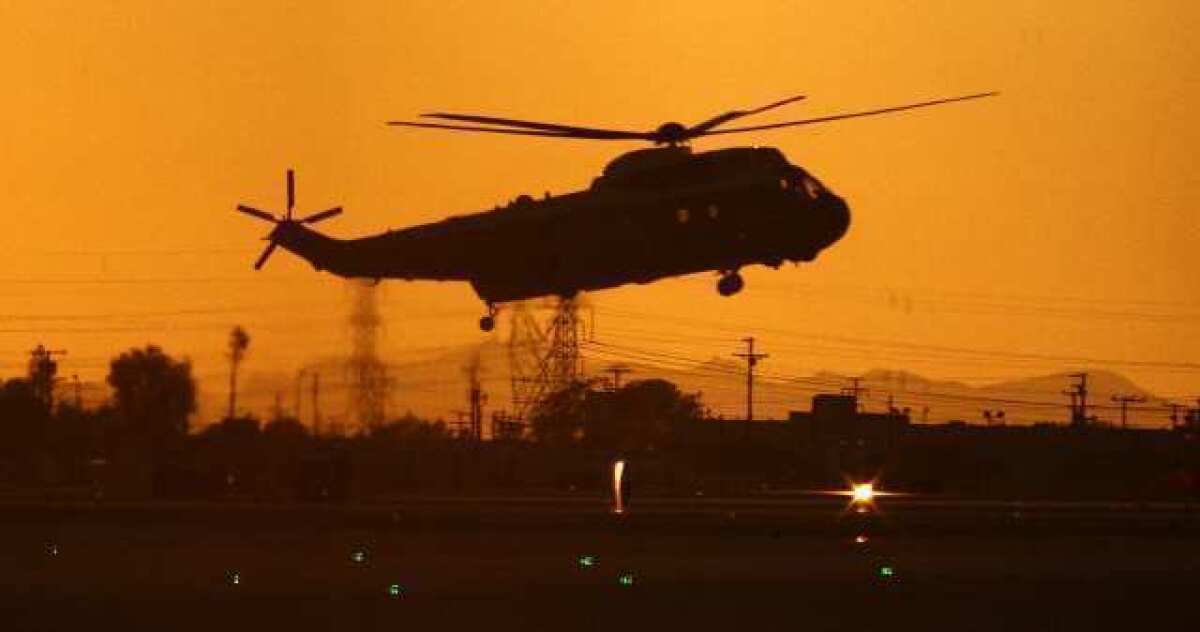 One of four large helicopters lands at Bob Hope Airport in Burbank on Wednesday, October 24, 2012, one of them carrying President Barack Obama. President Obama was heading to NBC studios for 'The Tonight Show with Jay Leno.'