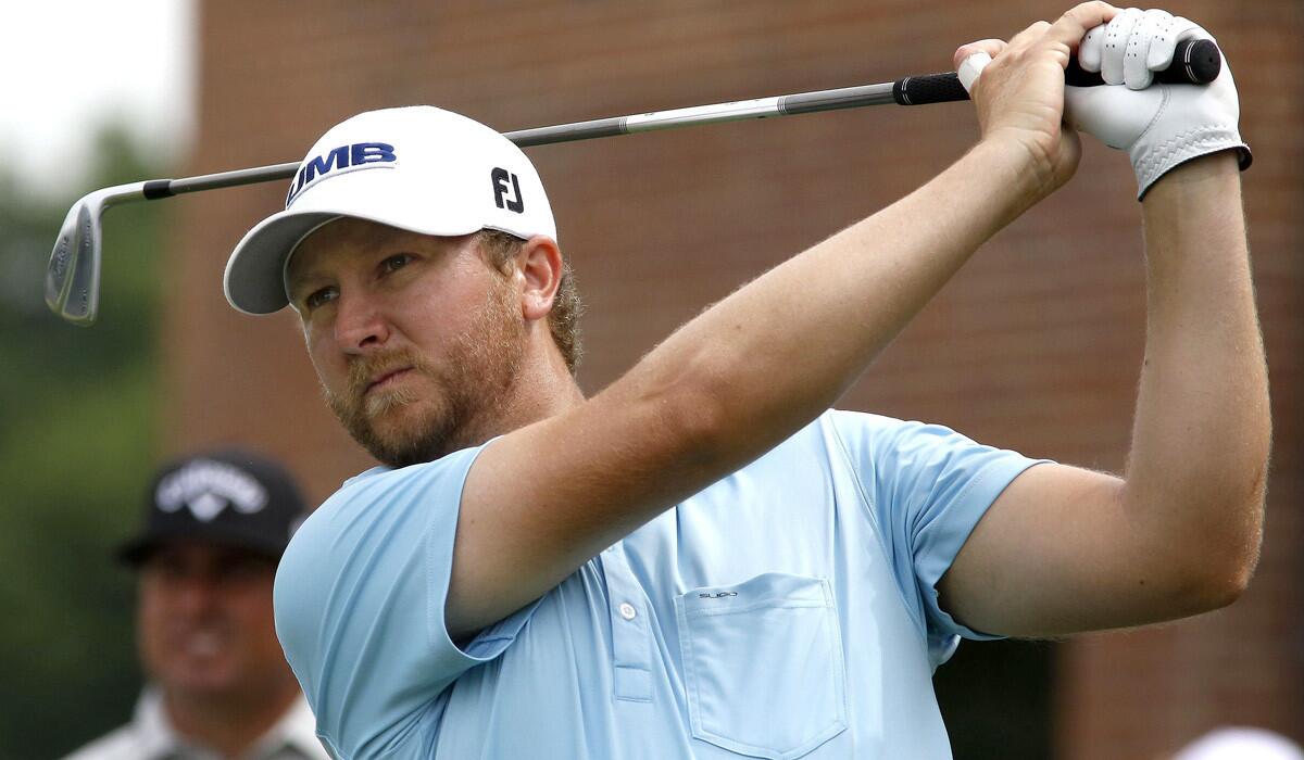 Brice Garnett watches his tee shot at No. 17 during the second round of the Crowne Plaza Invitational at Colonial on Friday.