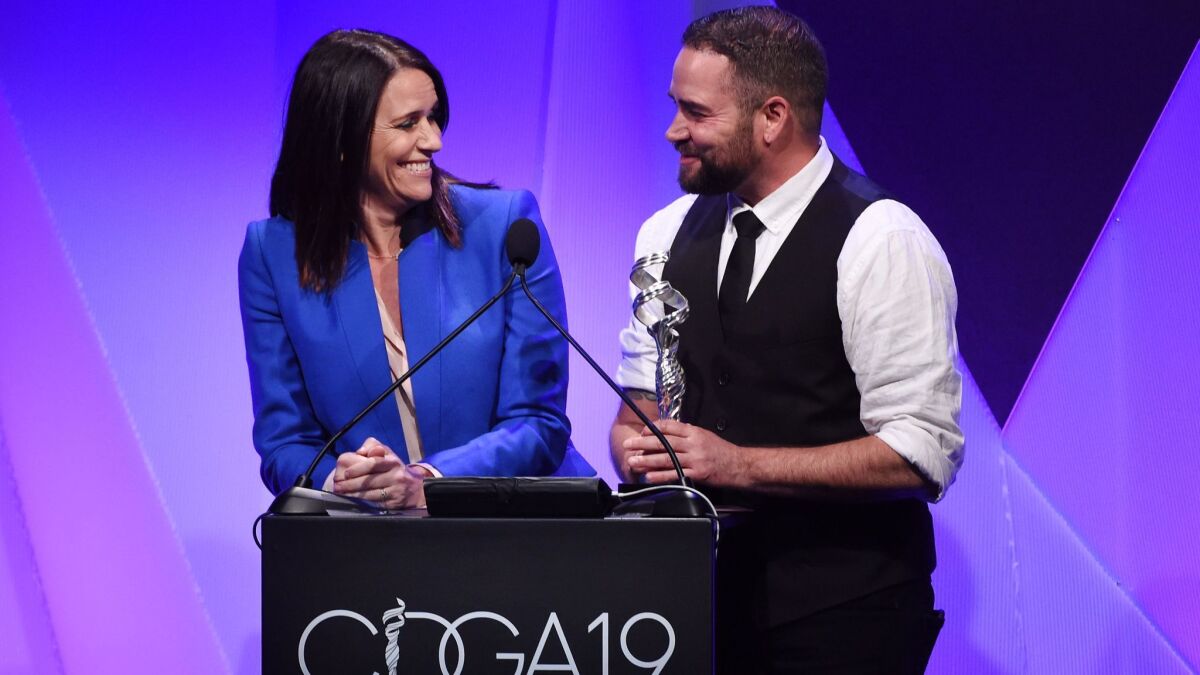 Amy Landecker and Ian Harvie speak onstage at the 19th Costume Designers Guild Awards.