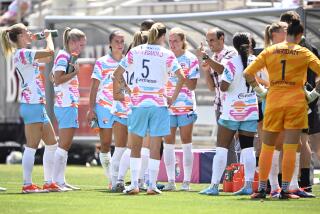 SAN DIEGO, CALIFORNIA - AUGUST 24: Landon Donovan of the San Diego Wave FC talks to Wave players during a pause in play in the first half against the Angel City FC at Snapdragon Stadium on August 24, 2024 in San Diego, California. (Photo by Orlando Ramirez/Getty Images)