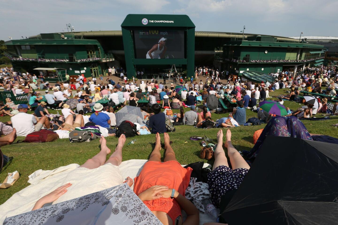 TENNIS-GBR-WIMBLEDON-FEATURE-WEATHER