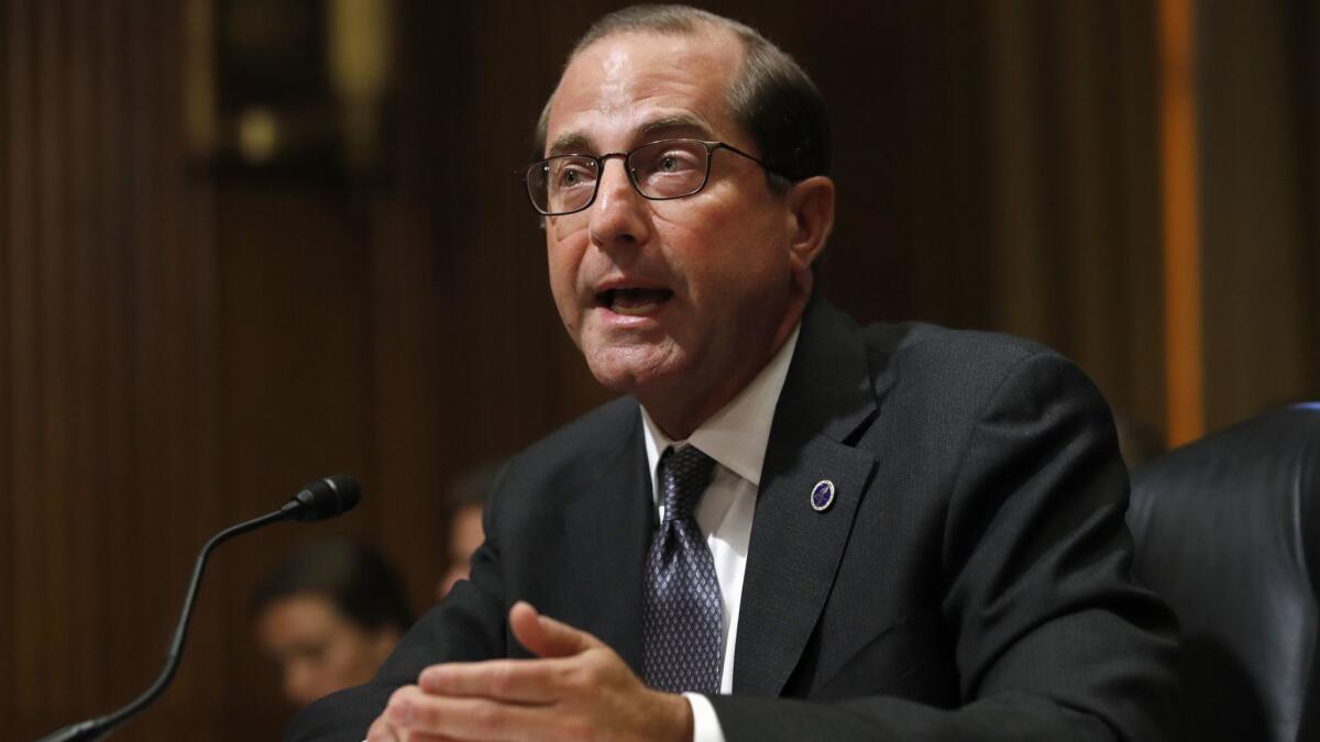 Health and Human Services Secretary Alex Azar speaks during a Senate Finance Committee hearing Tuesday. Azar said his department can't reunite separated kids with their parents as long as the parents are in detention while asylum cases are pending.
