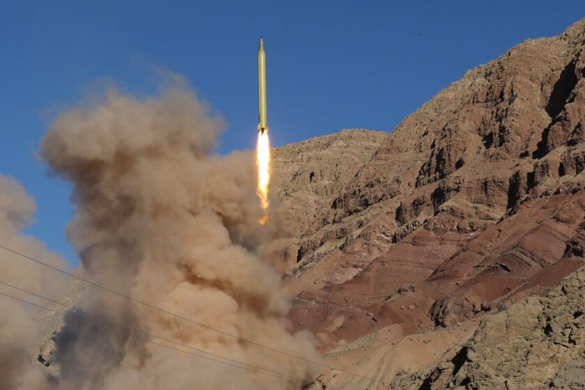 A long-range Qadr ballistic missile is launched in the Alborz mountain range in northern Iran on March 9.