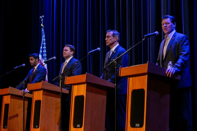 From left: Ammar Campa-Najjar, Carl DeMaio, former Congressman Darrell Issa and State Senator Brian Jones, candidates for the 50th congressional district, speak at a forum at the Maxine Theater on February 7, 2020 in Valley Center, California.