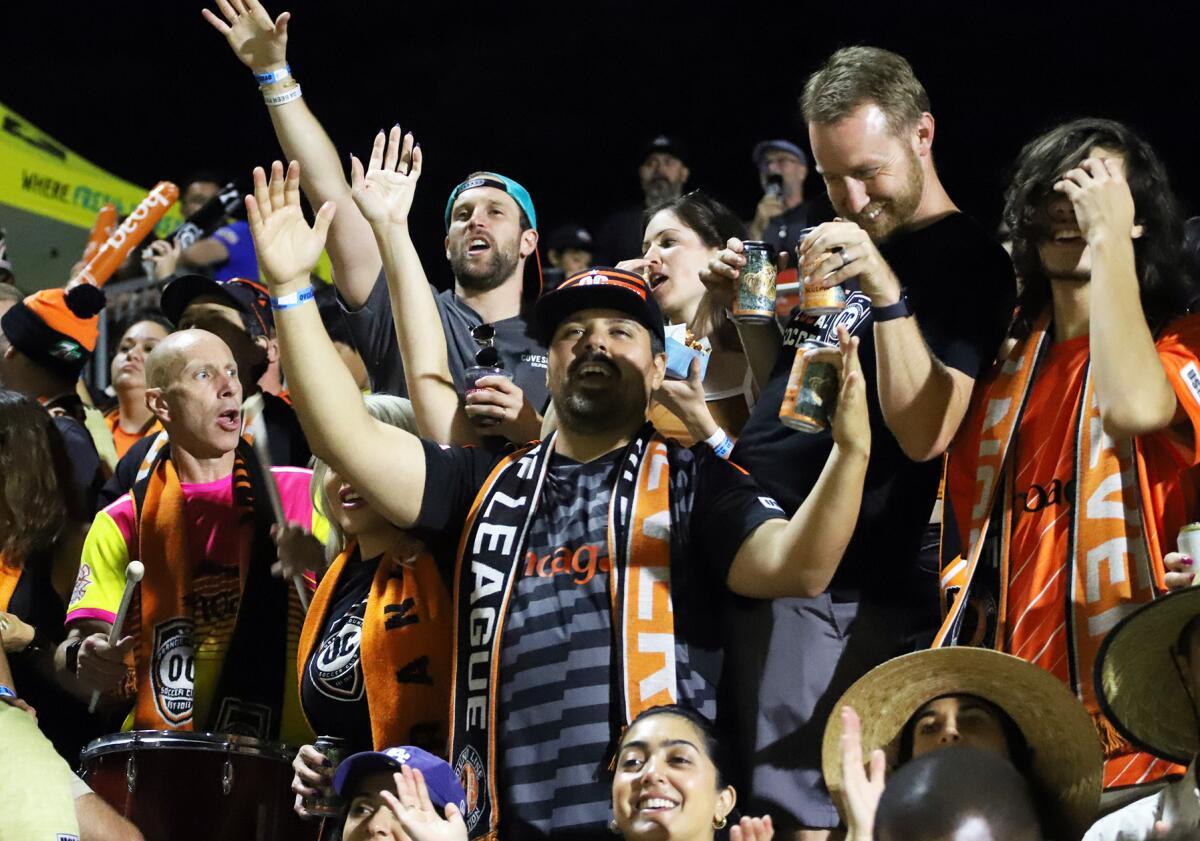 Orange County SC fans cheer for their team against San Antonio FC at Championship Soccer Stadium on Saturday.