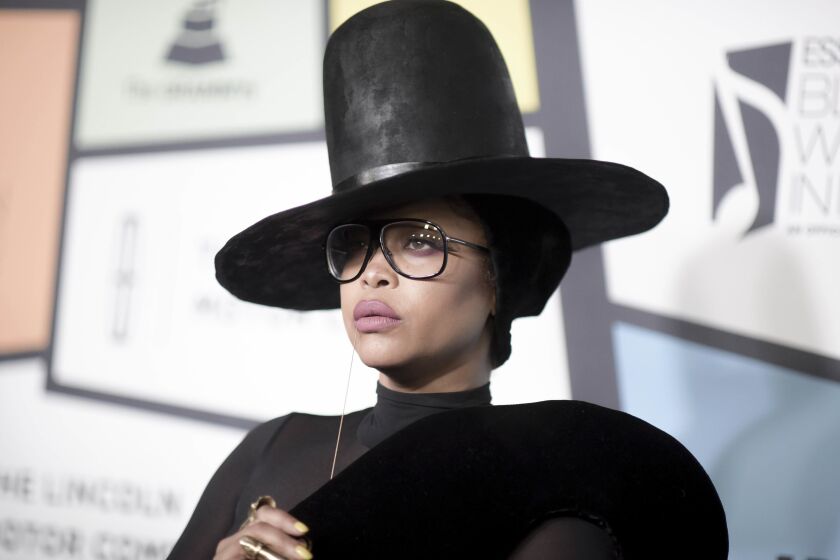 FILE - Erykah Badu attends the 8th Annual Essence Black Women in Music in Los Angeles on Feb. 9, 2017. The four-time Grammy winner released a 42-piece capsule collection with Italian fashion house Marni last month. (Photo by Richard Shotwell/Invision/AP, File)