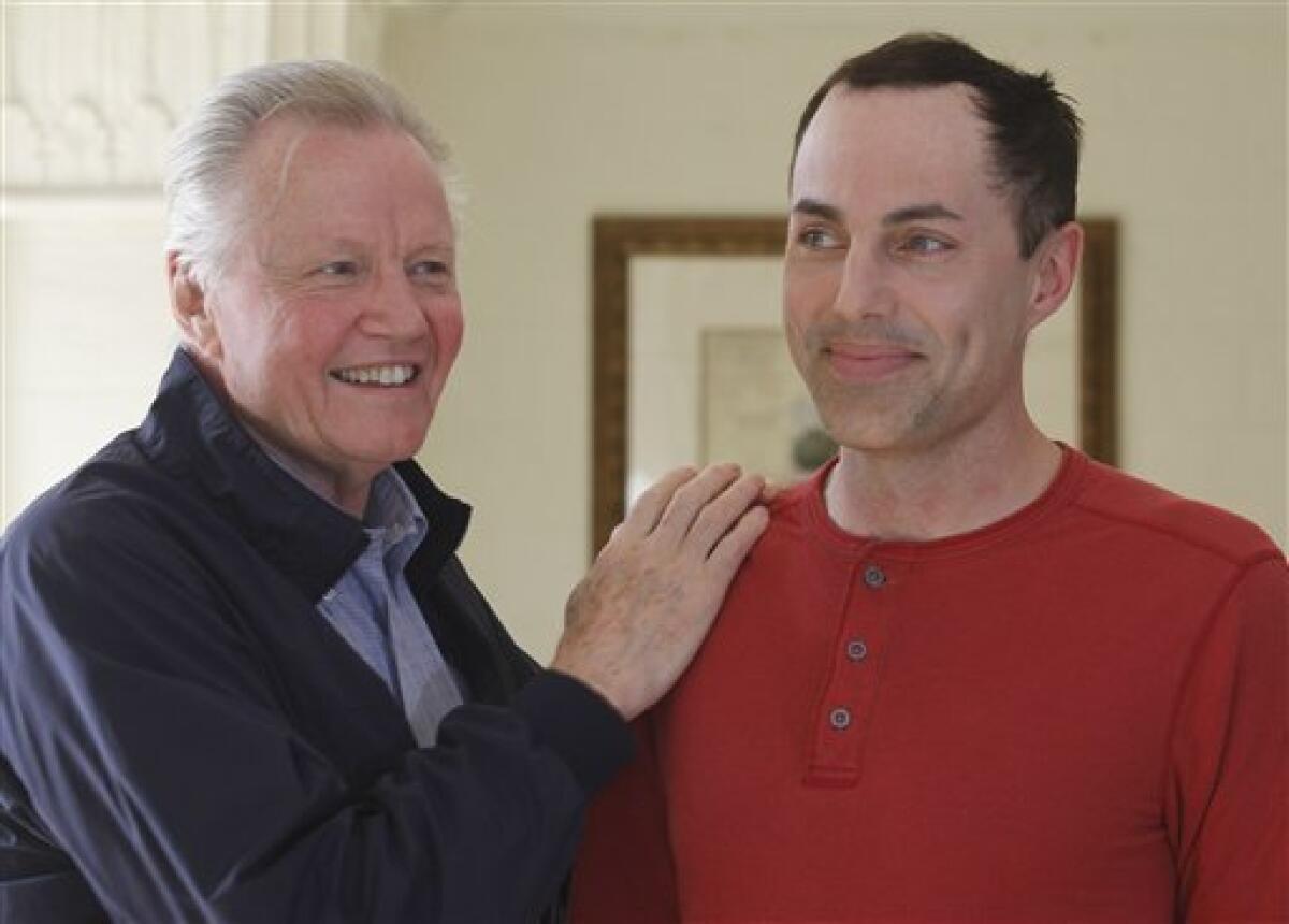 Actor Jon Voight, left, and his son, James Haven, give an interview to discuss Haven's new film "Deep In The Heart" in Austin, Texas on Wednesday, Feb. 15, 2012. The independent production is based on the true story of Dick Wallrath. He overcame alcoholism to reunite with his family, build a successful ranching business and then support college scholarships for rural kids through 4H and Future Farmers of America. (AP Photo/Jack Plunkett)