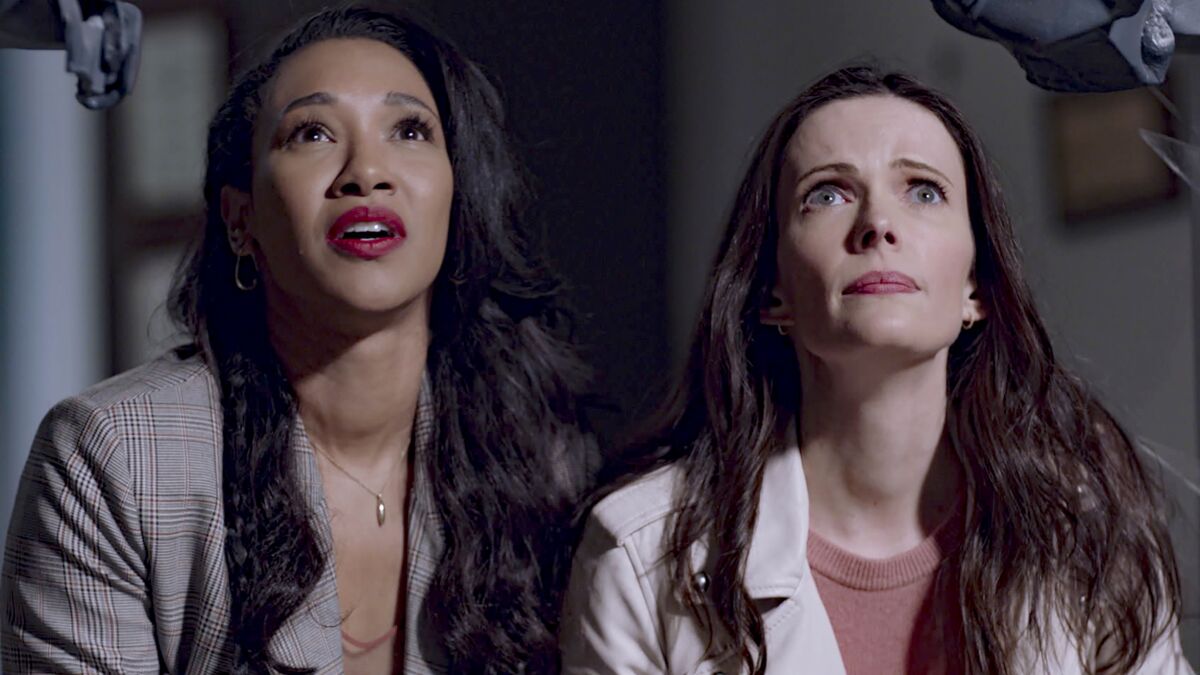 Candice Patton, left, and Elizabeth Tulloch in "Crisis on Infinite Earths: Part 2" on The CW.
