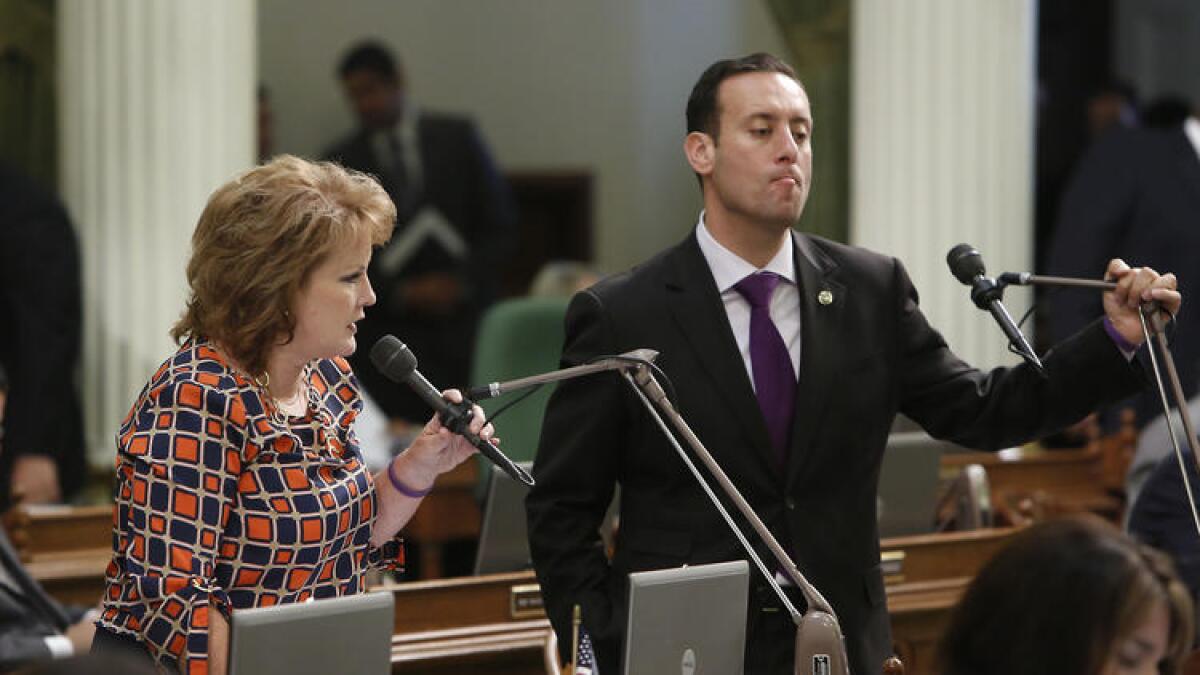 Assemblyman Roger Hernandez, right, with Assemblywoman Shannon Grove in 2013.