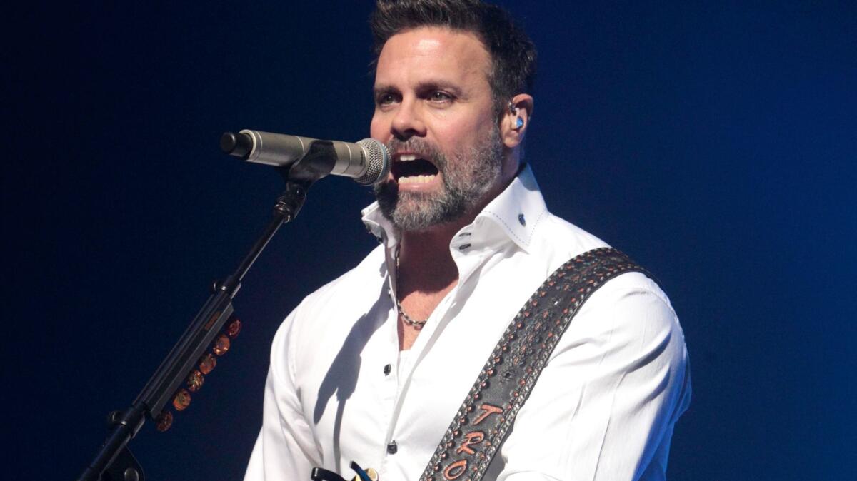 Troy Gentry of the country music duo Montgomery Gentry performs on the Rebels On The Run Tour in 2013.