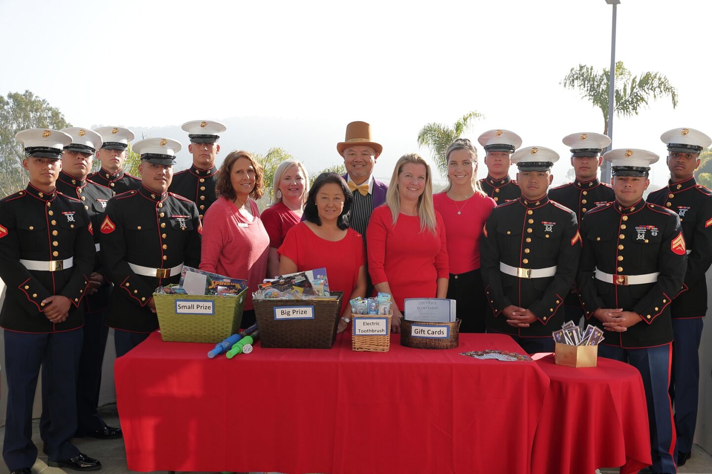 In the center are Dr. Curtis Chan and his wife Mae surrounded by his staff and Marines from Camp Pendleton.