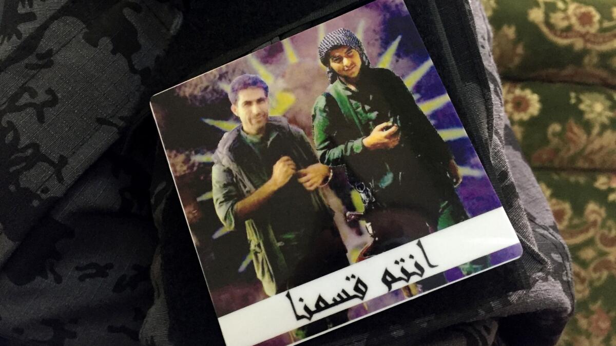 Asayish, Kurdish police: Charged with holding areas cleared of Islamic State, they often find themselves working with the military to root out sleeper cells and confront militants. Officer Haval Mirwan works in an area west of Raqqah wearing a patch that honors his brother, Bilind, 36 (left) and friend Navi Sheraman, 20 (right), Kurdish soldiers killed two years ago fighting Islamic State. He had left Syria for Germany at the time, but returned to fight. âI will not leave until Daesh is gone,â he said, using an Arabic acronym for Islamic State. Last week, his officers caught a militant disguised as a woman milling with the afternoon crowd on a busy shopping street. He suspected the fighter was a spy, or had planned to attack. âNow that we caught him, maybe they will send somebody else to do an explosion,â he said.