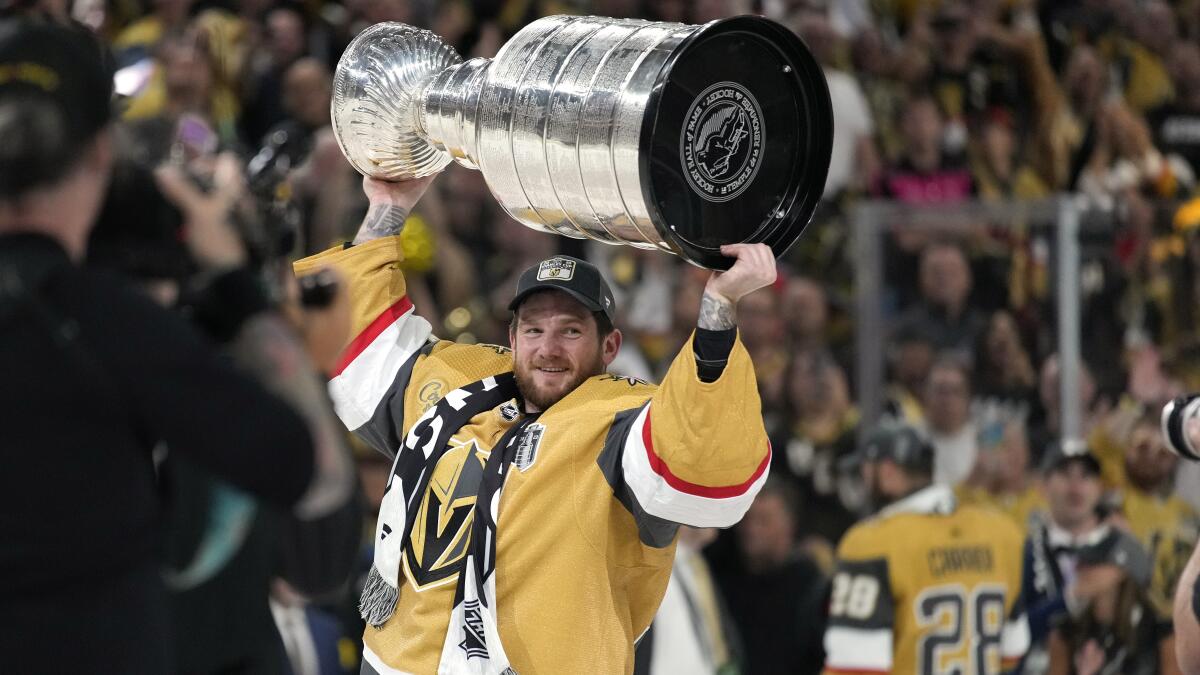 Golden Knights players celebrate with the Stanley Cup trophy — PHOTOS, Golden Knights