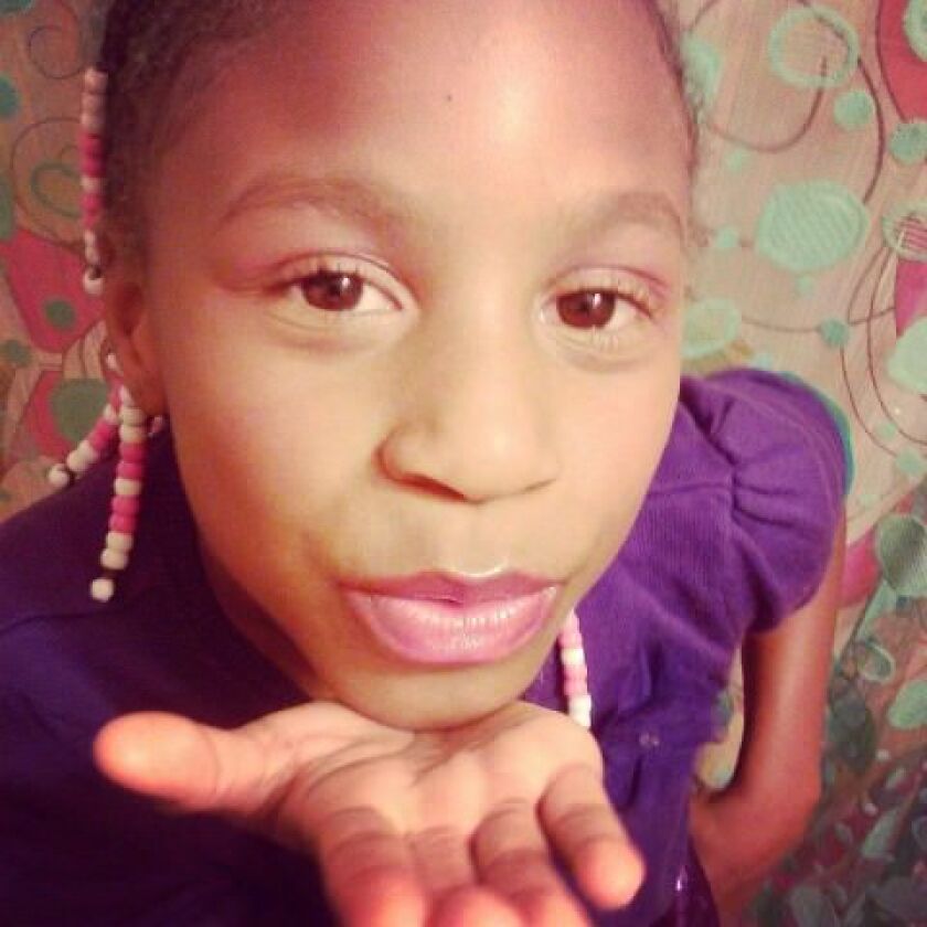 Tioni Theus, whose body was found dumped along the 110 Freeway, shown in an undated family photo.