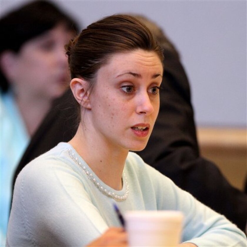Casey Anthony reacts as a potential juror tells Ninth circuit chief judge Belvin Perry that he thinks Anthony is guilty in the courtroom at the Pinellas County Criminal Justice Center Monday, May 9, 2011 on the first day of jury selection for her trial in Clearwater, Fla. The trial of 25-year-old Anthony, who is charged with murdering her daughter, will take place in Orlando, but jurors are being selected outside the Orlando area because of intense media coverage. (AP Photo/Joe Burbank, Pool)