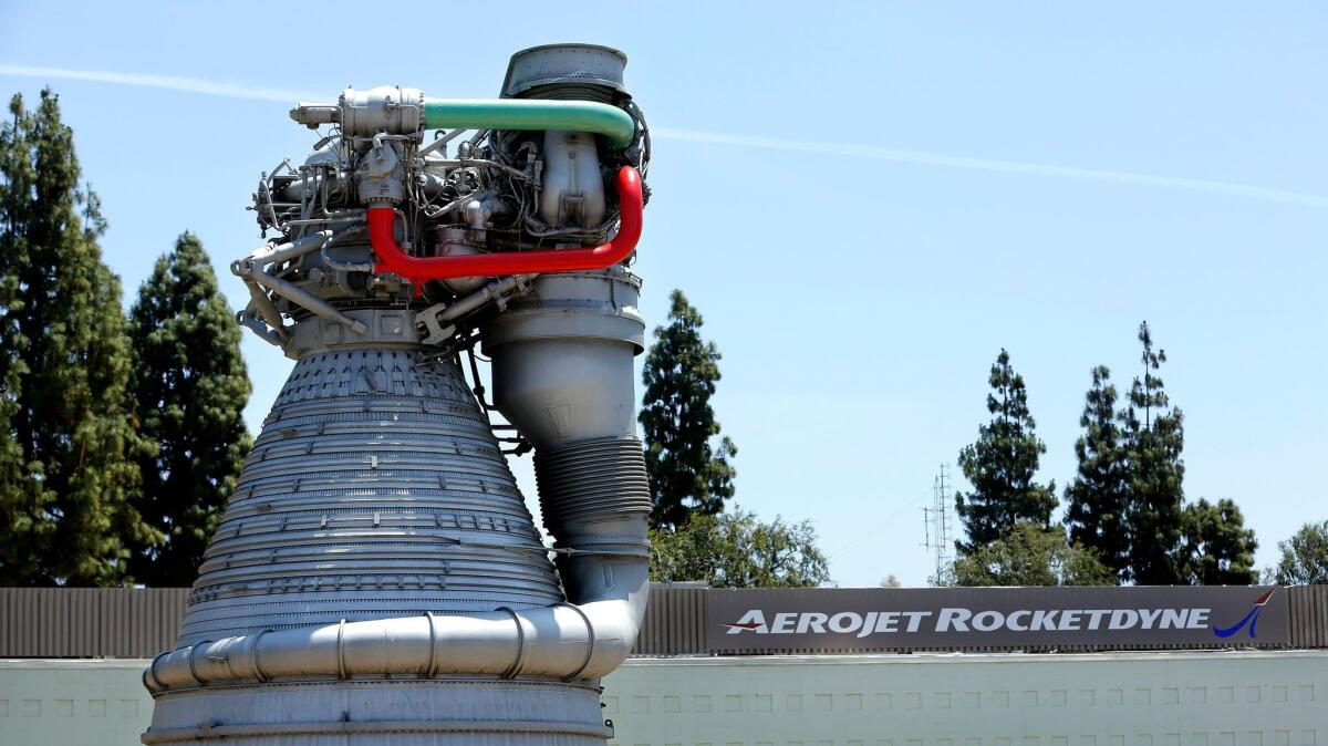 A model of the rocket engine used in the Saturn V rocket stands at the entrance to Aerojet Rocketdyne's facility in Canoga Park on May 28, 2015.