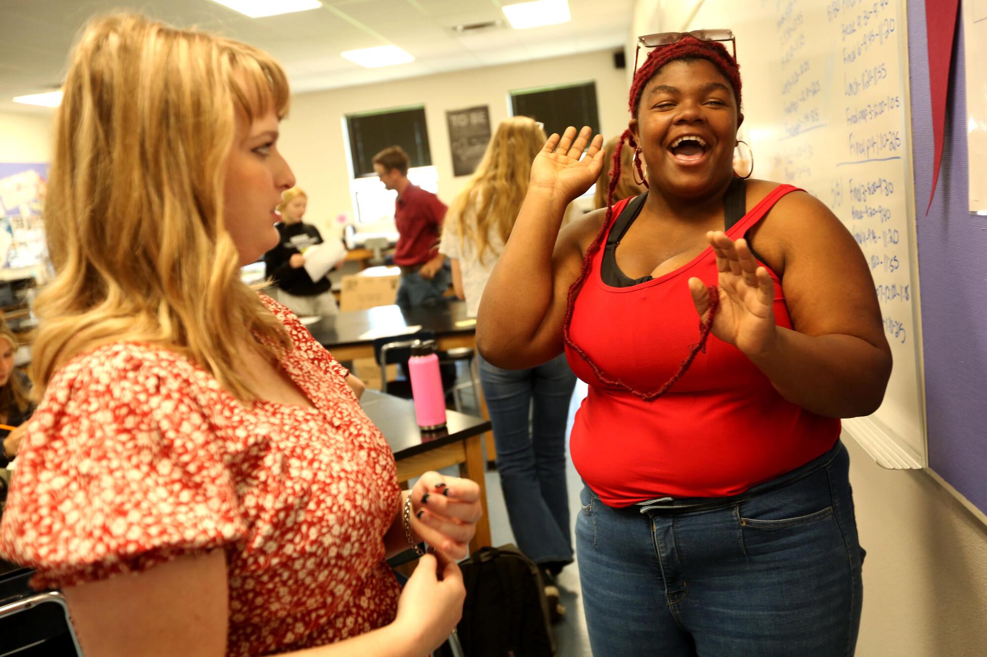 Ruby Sparks, right, and Natalie Bunker chat about life after graduation during a physics class at Modoc High School.
